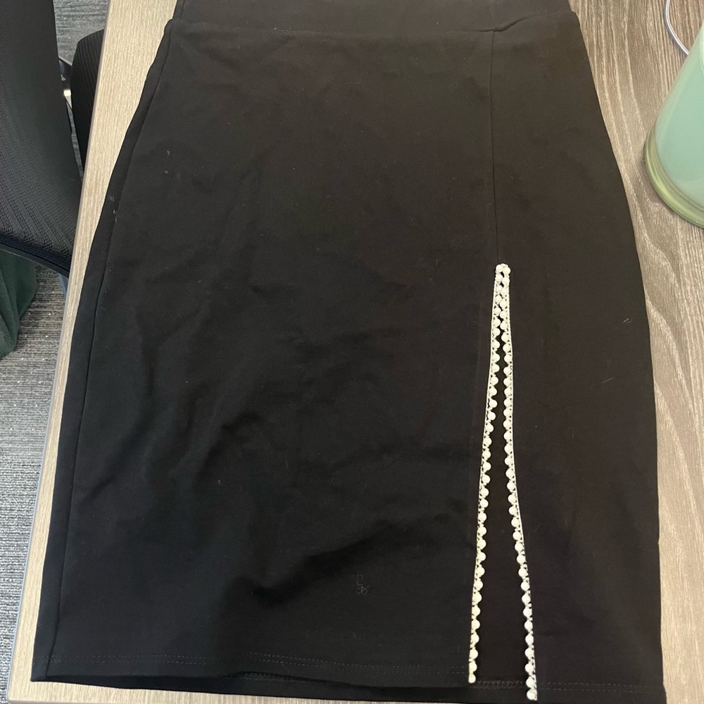 pearl trimmed black skirt